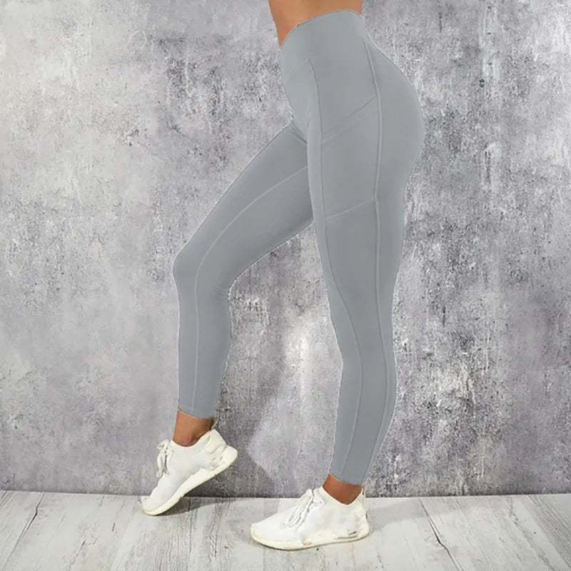 Calza de entrenamiento de tiro alto con bolsillo