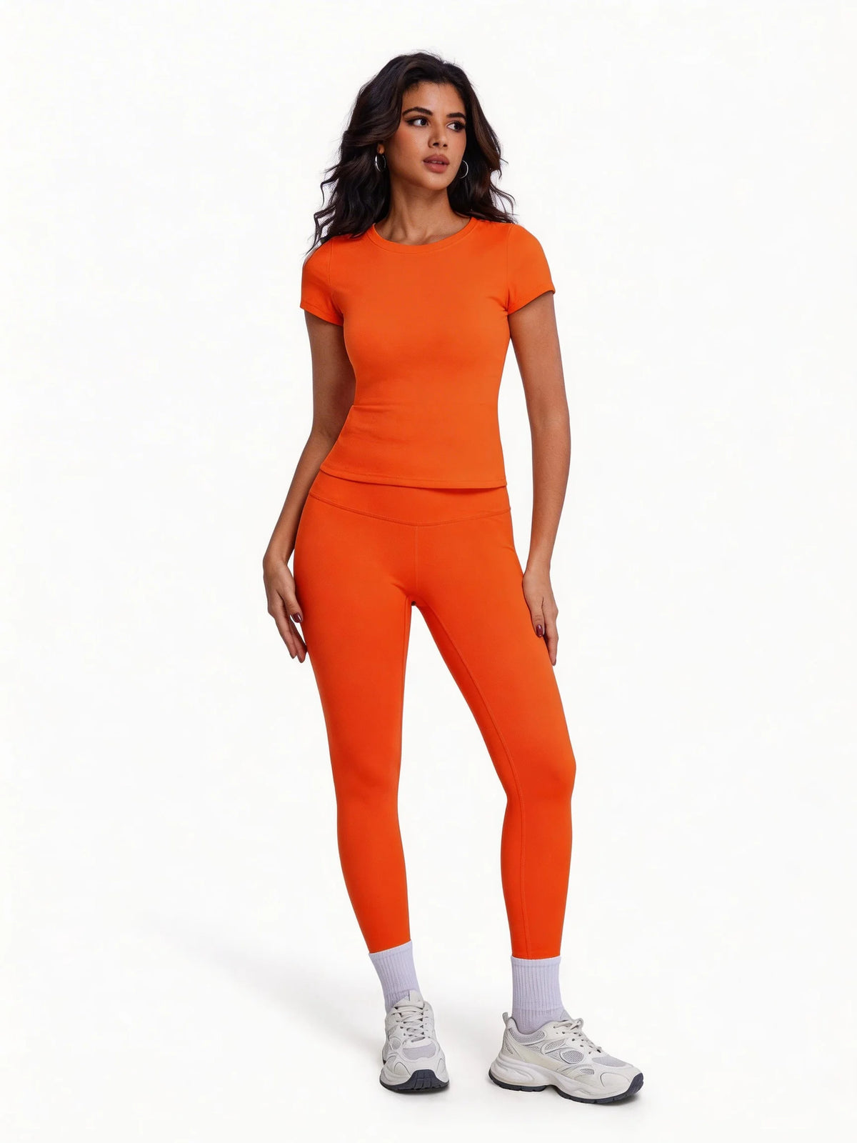 Conjunto deportivo de remera manga corta y calza de tiro alto