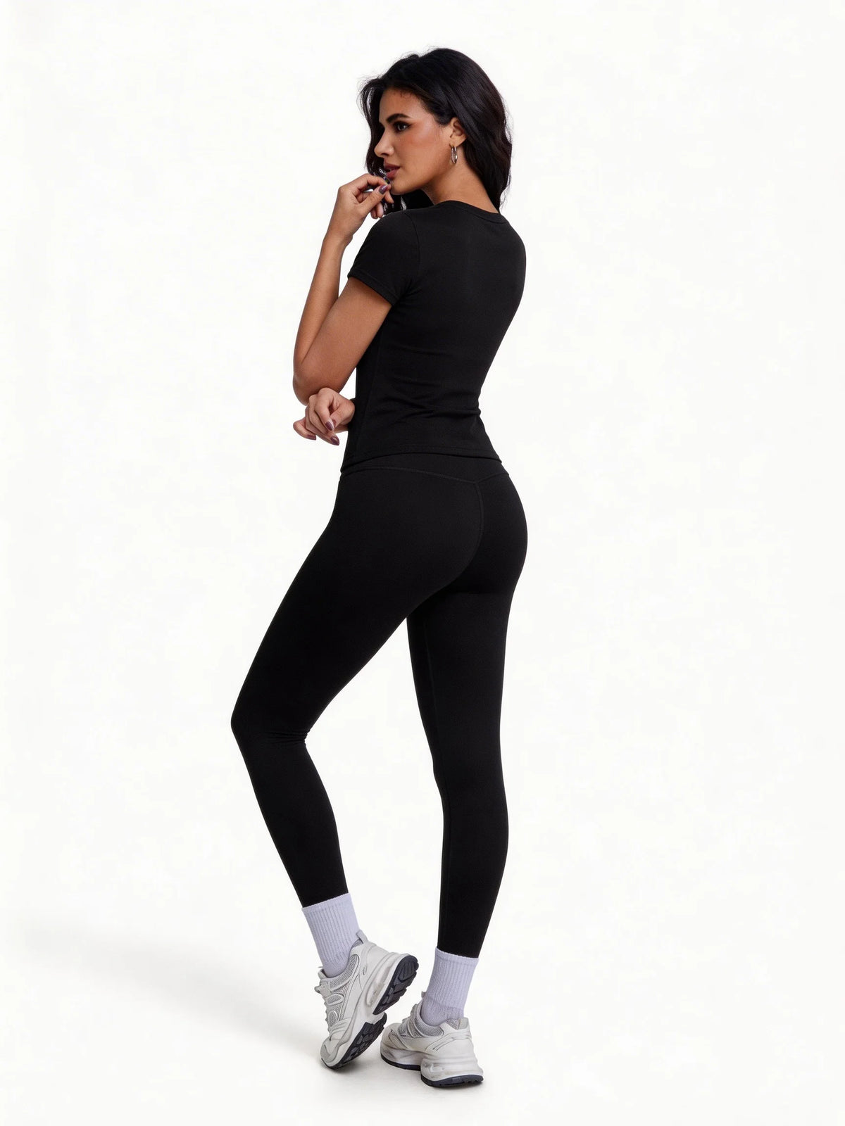 Conjunto deportivo de remera manga corta y calza de tiro alto