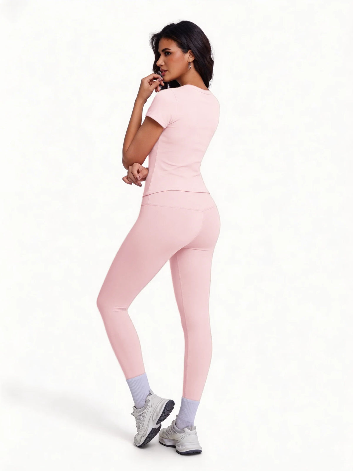 Conjunto deportivo de remera manga corta y calza de tiro alto