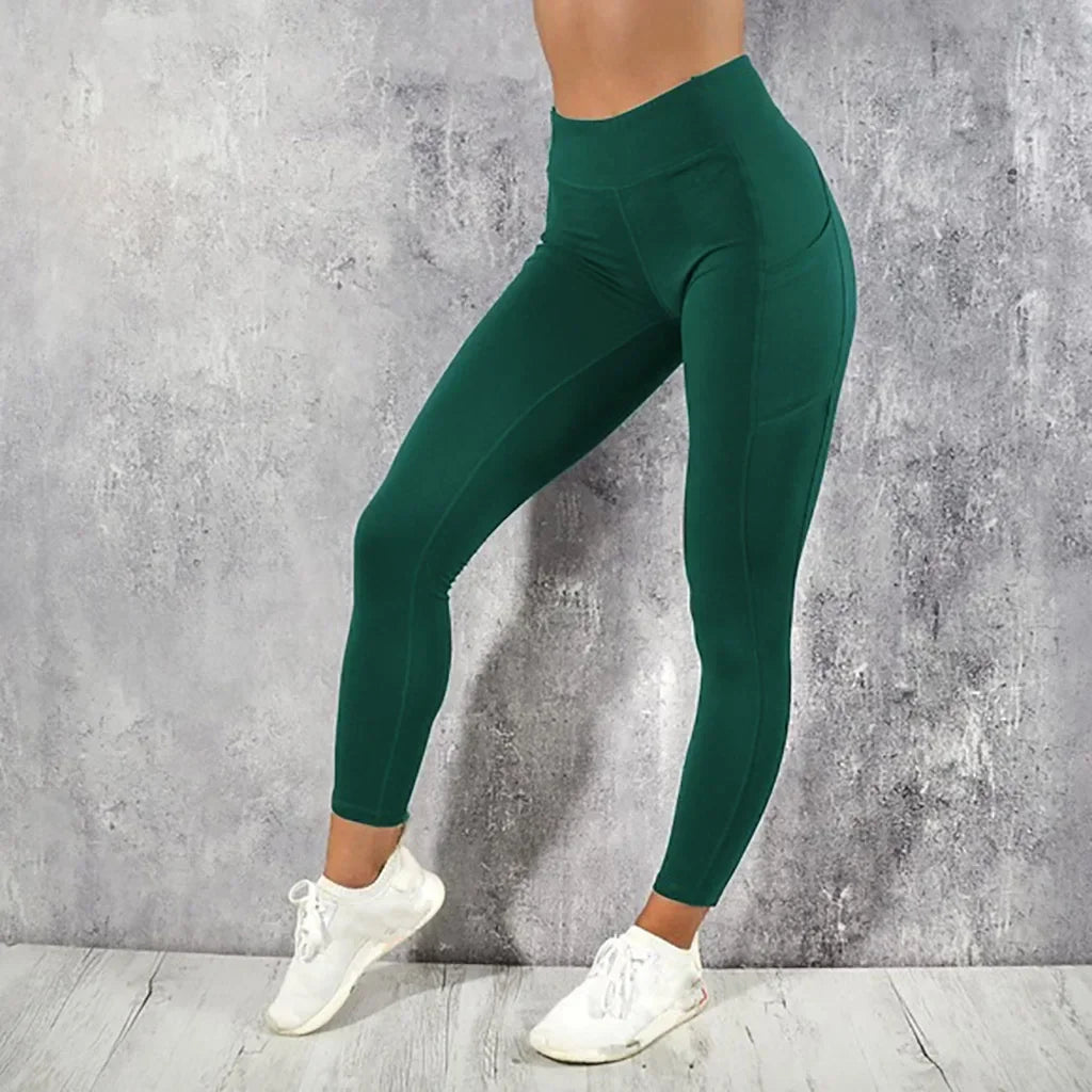 Calza de entrenamiento de tiro alto con bolsillo