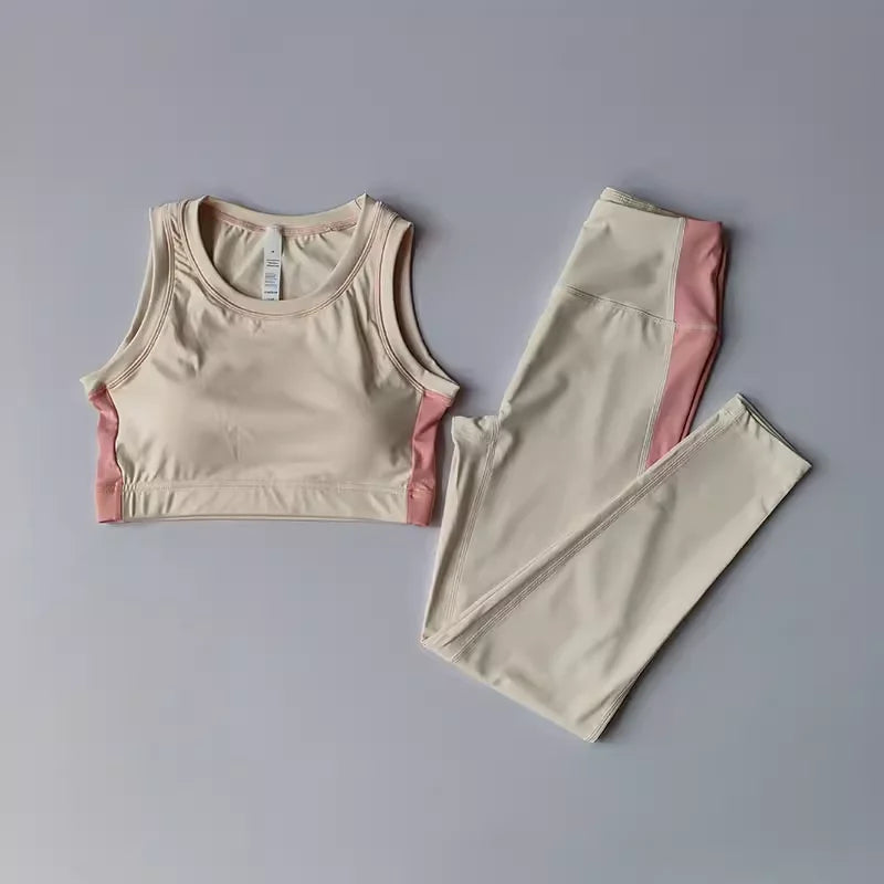 Conjunto deportivo de top y calza de tiro alto con bloques de color