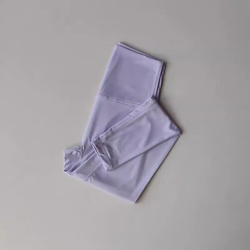 Conjunto deportivo de top y calza de tiro alto con bloques de color