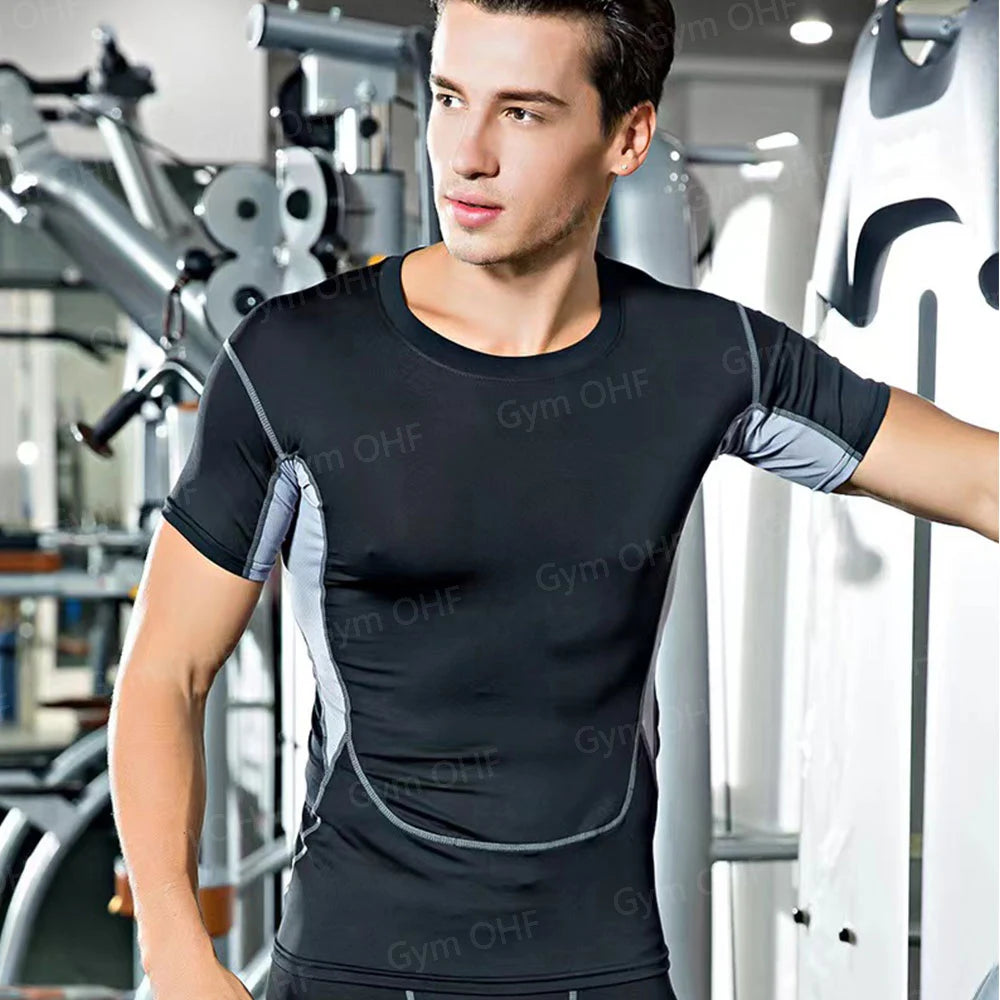 Remera deportiva ajustada de hombre de manga corta