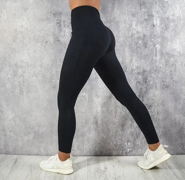 Calza de entrenamiento de tiro alto con bolsillo
