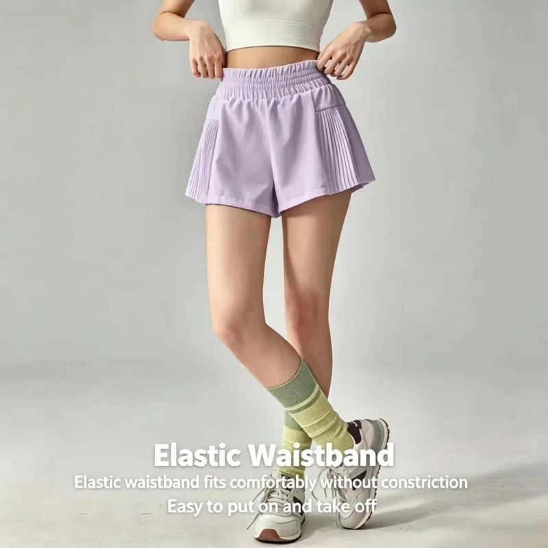 Short de doble capa con bolsillos y frunces laterales