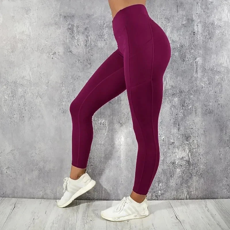 Calza de entrenamiento de tiro alto con bolsillo