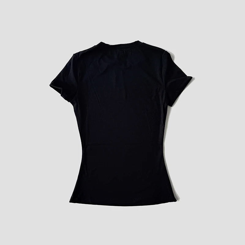 Conjunto deportivo de mujer de remera manga corta y calza