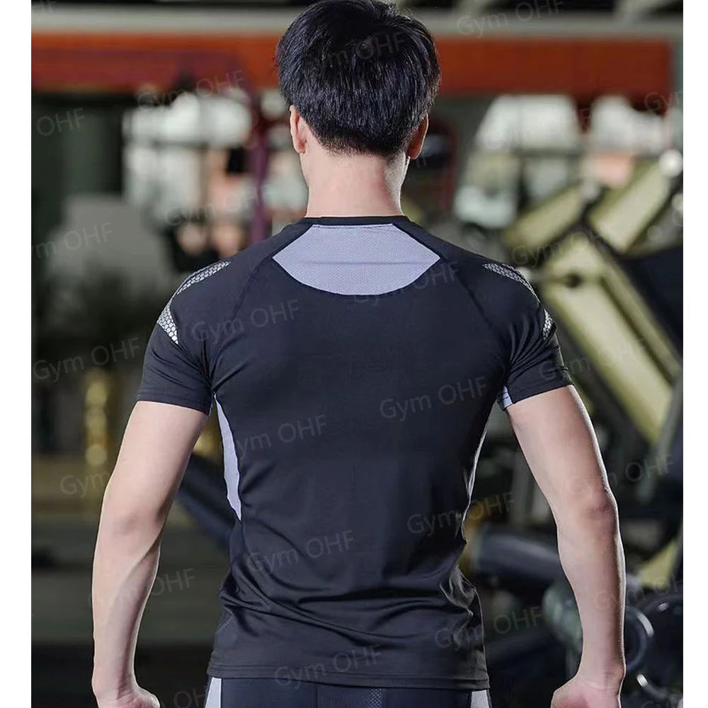 Remera deportiva ajustada de hombre de manga corta