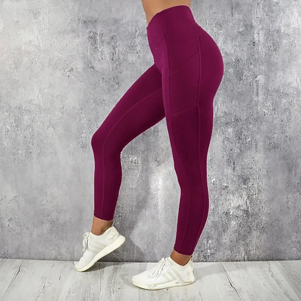 Calza de entrenamiento de tiro alto con bolsillo