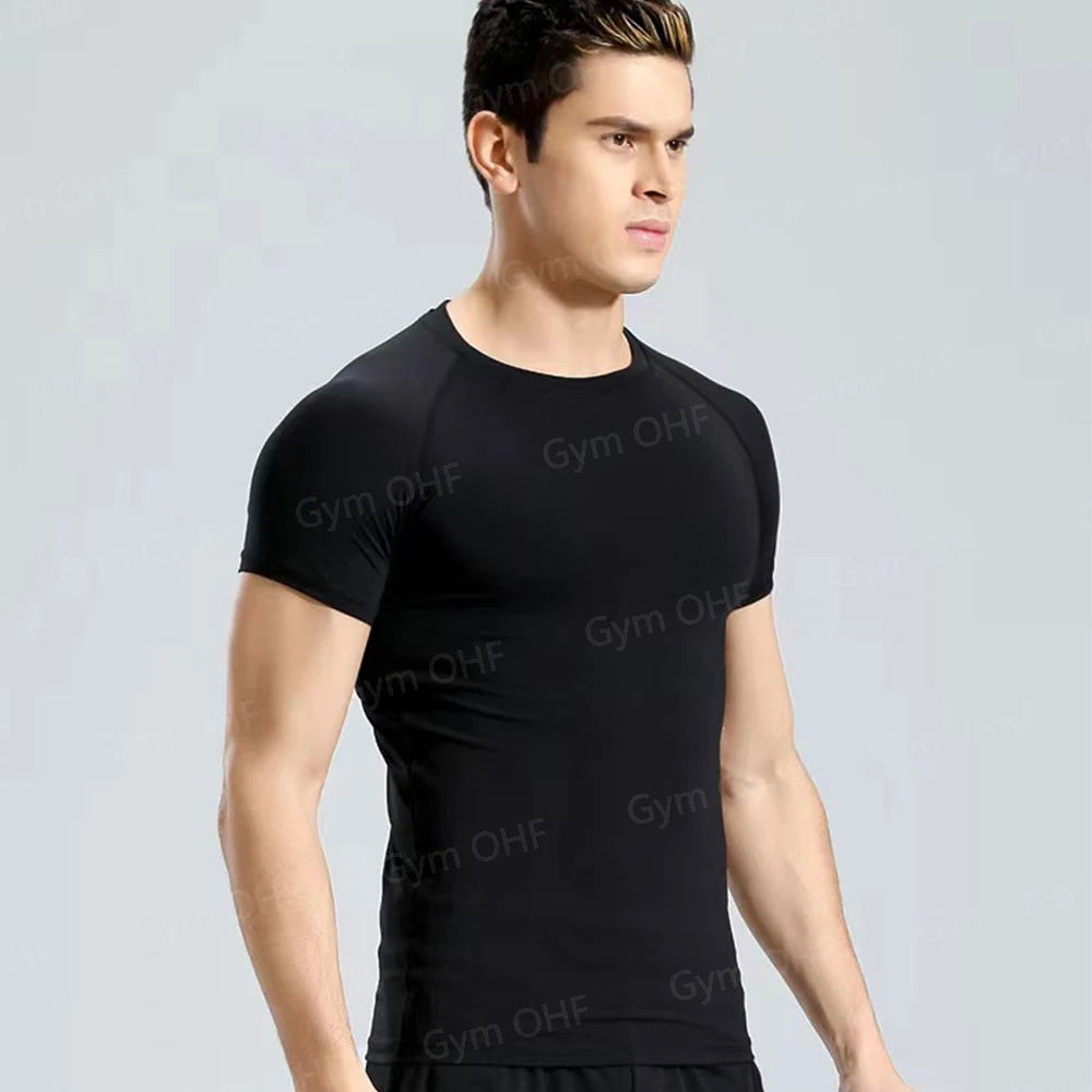 Remera deportiva ajustada de hombre de manga corta