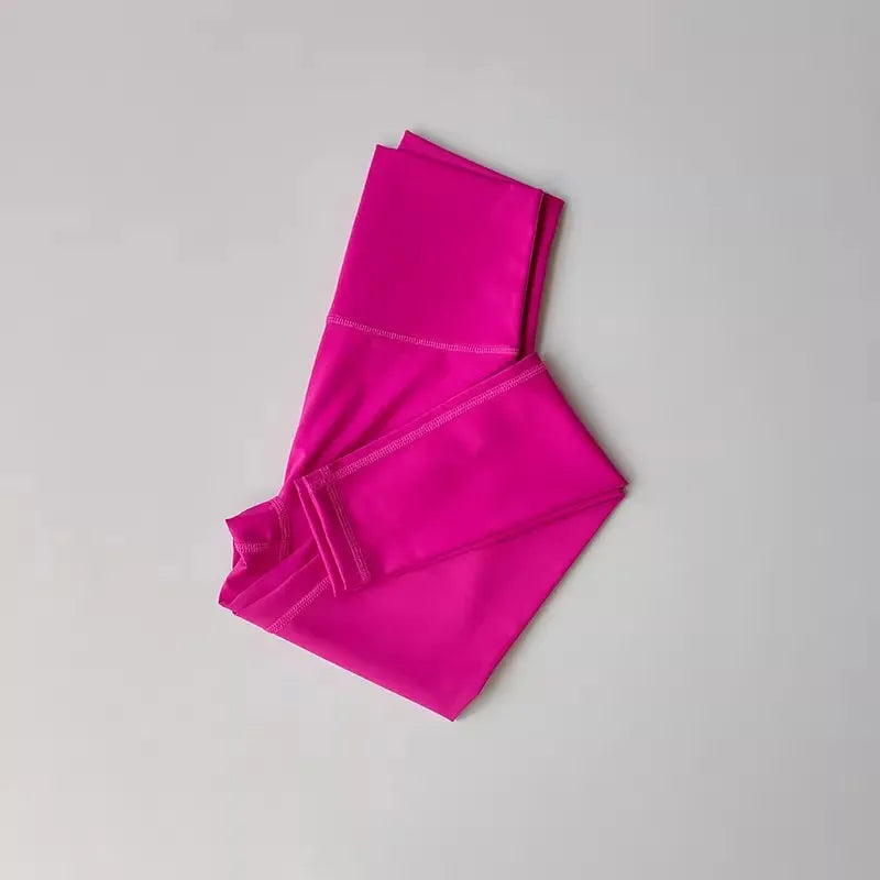 Conjunto deportivo de top y calza de tiro alto con bloques de color