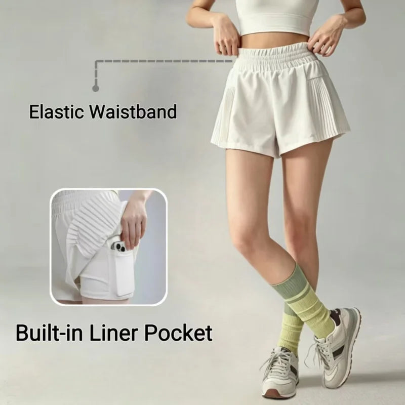 Short de doble capa con bolsillos y frunces laterales