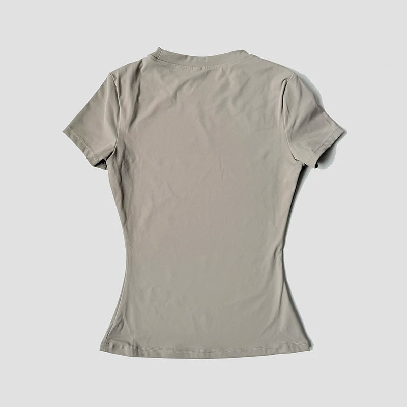 Conjunto deportivo de mujer de remera manga corta y calza