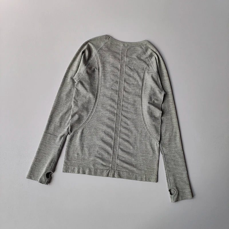 Remera deportiva de mujer sin costuras con cuello redondo